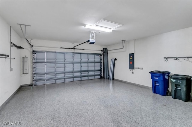 garage featuring a garage door opener