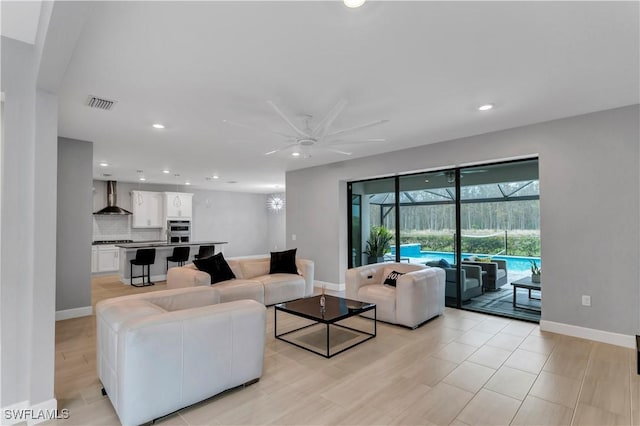 living room with ceiling fan