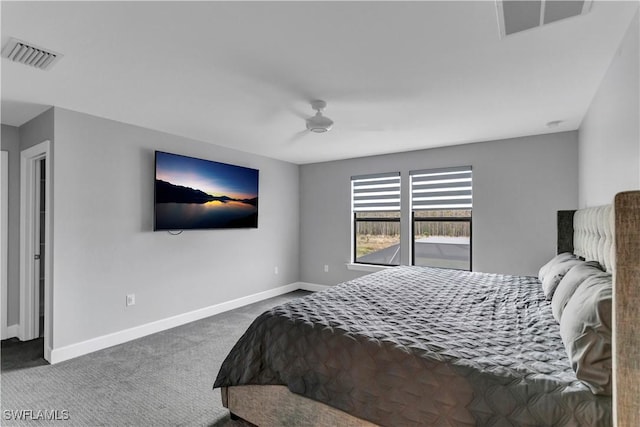 bedroom with ceiling fan and carpet