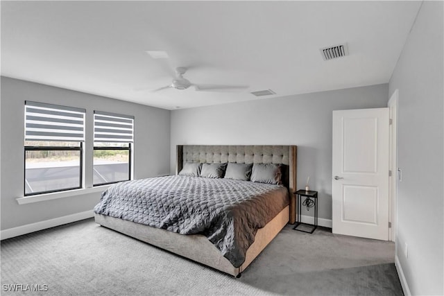 bedroom featuring ceiling fan and carpet floors