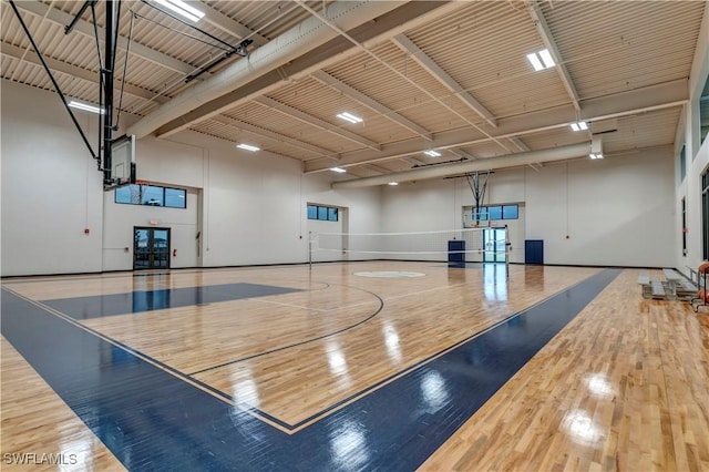 view of basketball court with volleyball court