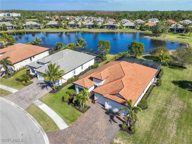 bird's eye view with a water view