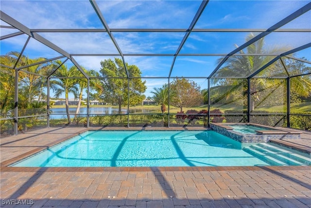 view of pool with a water view, an in ground hot tub, a lanai, and a patio area