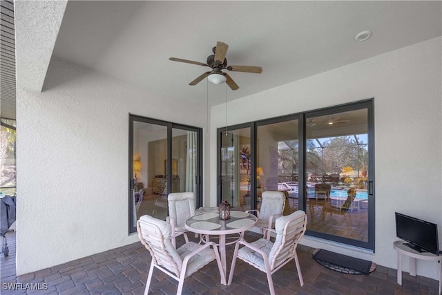 view of patio / terrace with ceiling fan