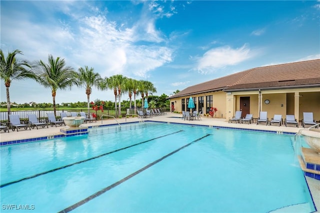 view of pool featuring a patio