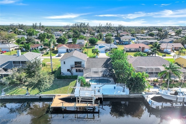 drone / aerial view with a water view