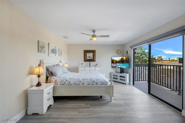 bedroom with ceiling fan, light hardwood / wood-style flooring, and access to exterior