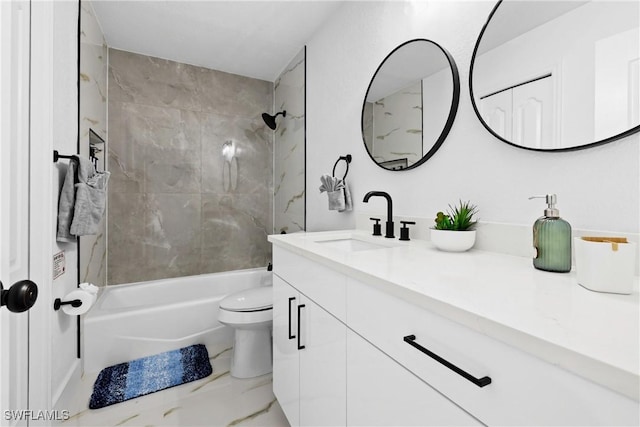 full bathroom with tiled shower / bath combo, vanity, and toilet