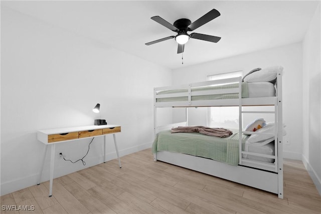 bedroom featuring ceiling fan and light hardwood / wood-style floors