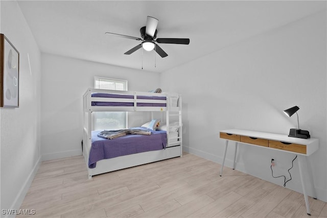 bedroom featuring ceiling fan and light hardwood / wood-style flooring