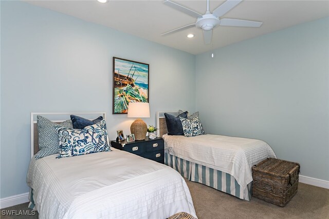 carpeted bedroom featuring ceiling fan