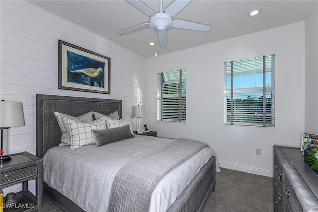 carpeted bedroom with ceiling fan