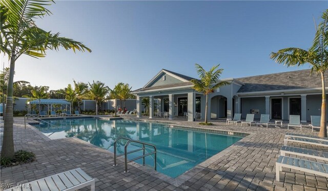 view of swimming pool featuring a patio