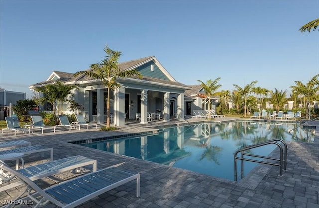 view of pool featuring a patio area