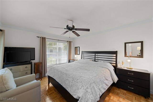 bedroom with ceiling fan, crown molding, and light parquet flooring