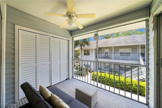 exterior space featuring ceiling fan