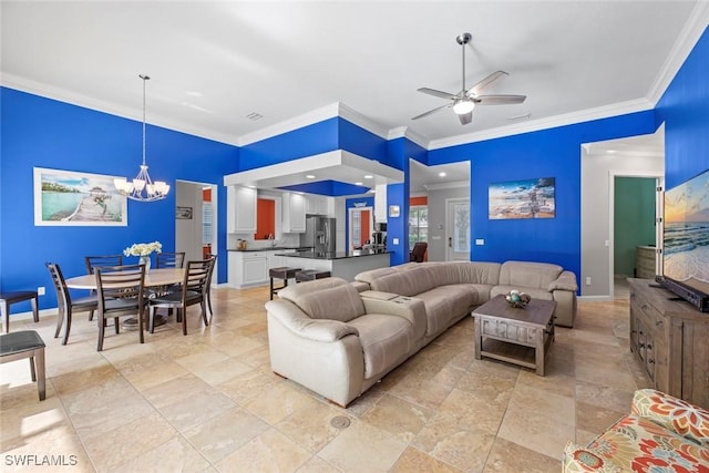 living room with crown molding and ceiling fan with notable chandelier