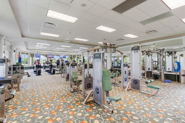 gym featuring a paneled ceiling