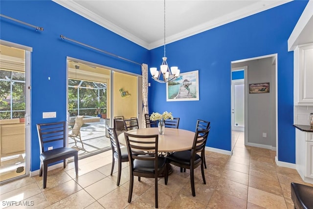 tiled dining space with a healthy amount of sunlight, a chandelier, and crown molding