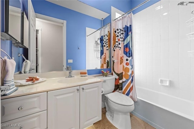 full bathroom featuring tile patterned floors, toilet, vanity, and shower / bath combo