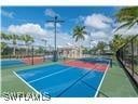 view of sport court featuring basketball hoop