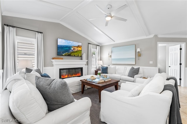 tiled living room featuring ceiling fan, ornamental molding, and lofted ceiling with beams