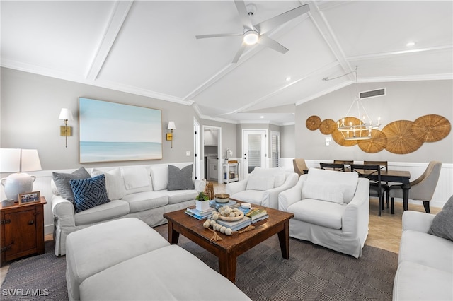 living room with ceiling fan with notable chandelier, ornamental molding, and lofted ceiling with beams