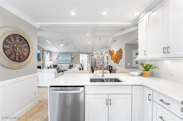 kitchen with dishwasher, white cabinetry, ornamental molding, ceiling fan, and sink