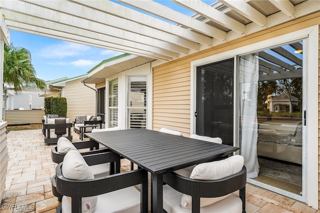 view of patio / terrace with a pergola and outdoor lounge area