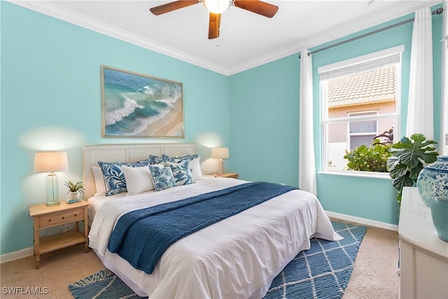 carpeted bedroom featuring multiple windows, ceiling fan, and ornamental molding