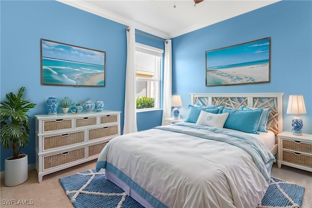 bedroom with light colored carpet and crown molding