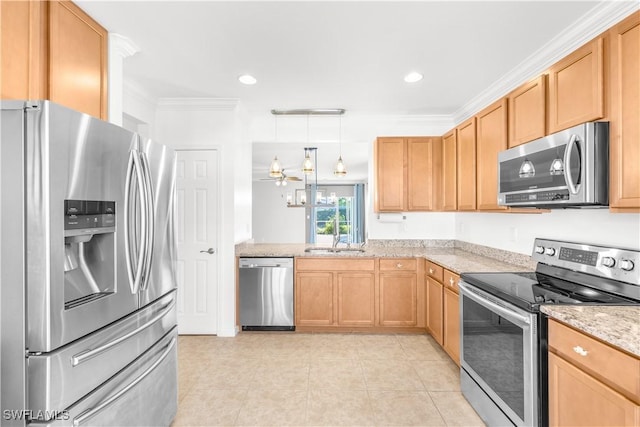 kitchen with appliances with stainless steel finishes, light stone counters, crown molding, sink, and decorative light fixtures