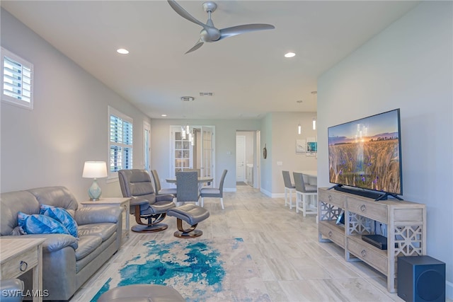 living room featuring ceiling fan