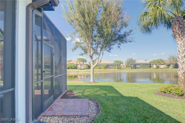 view of yard with a water view