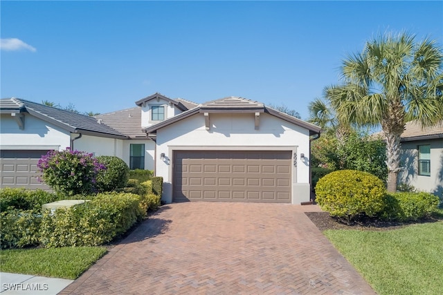 view of front of property featuring a garage