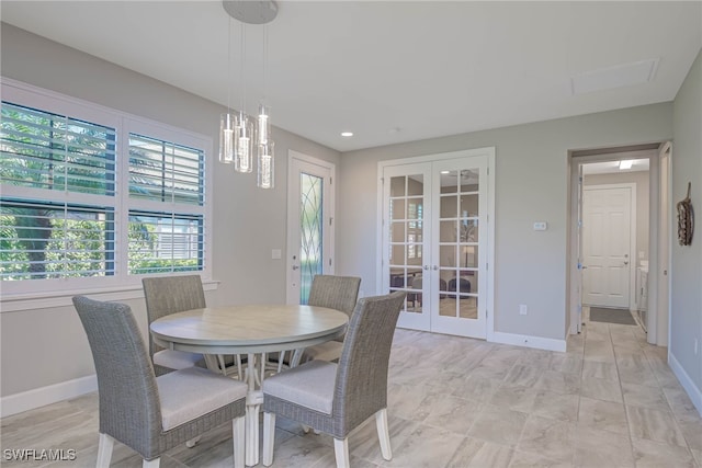 dining room featuring french doors