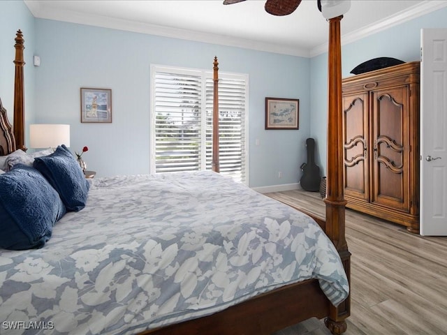 bedroom featuring ornamental molding, ceiling fan, and light hardwood / wood-style flooring