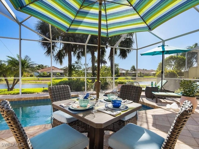 view of patio featuring glass enclosure