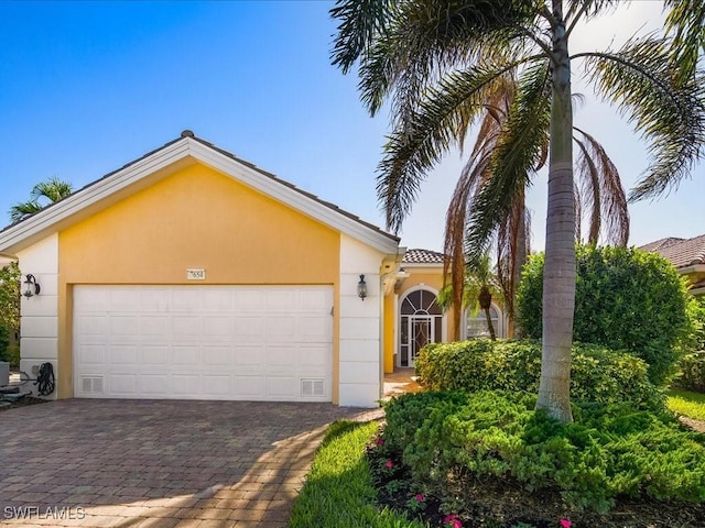 view of front of house with a garage