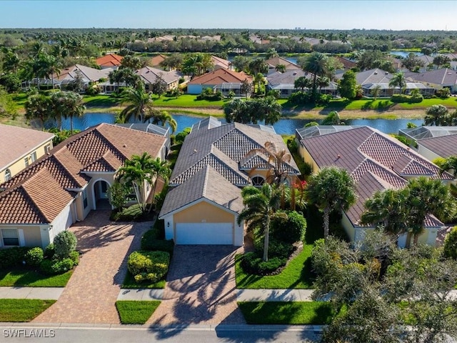 bird's eye view with a water view