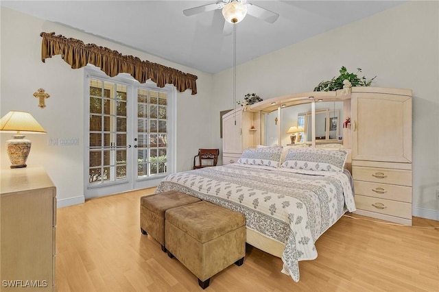 bedroom with ceiling fan and light hardwood / wood-style floors