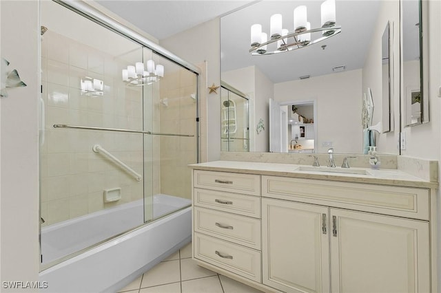 bathroom with enclosed tub / shower combo, tile patterned flooring, and vanity