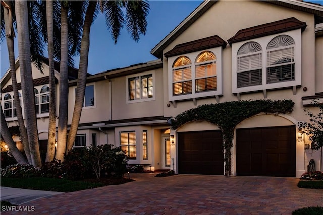 view of front of house with a garage