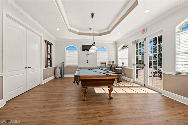 playroom featuring light wood-type flooring, crown molding, a raised ceiling, and billiards