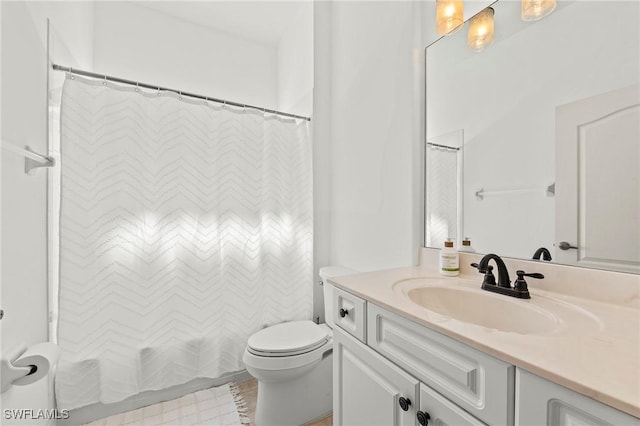 full bathroom with tile patterned floors, toilet, vanity, and shower / tub combo with curtain