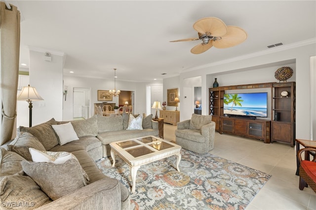 tiled living room with ceiling fan and ornamental molding