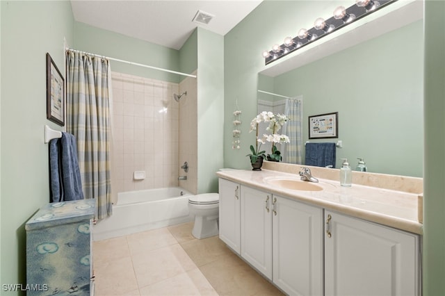 full bathroom with tile patterned floors, vanity, toilet, and shower / tub combo with curtain