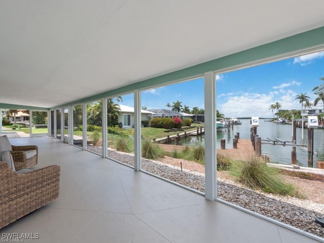 sunroom with a water view