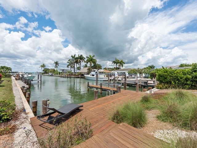 view of dock with a water view and boat lift