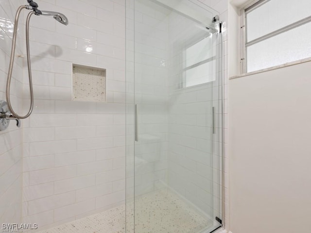 full bathroom with a shower stall